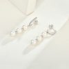 Eternal Elegance Triple Pearl Earrings